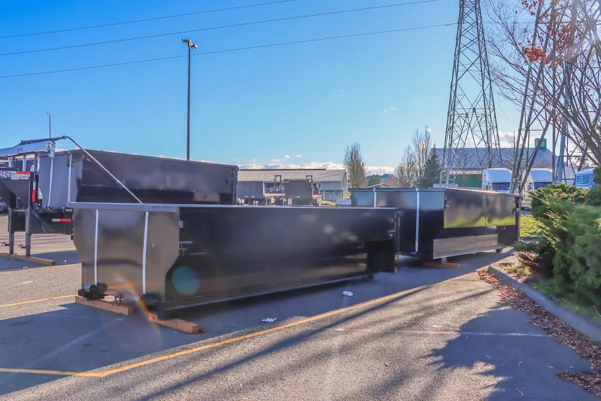 Roll-off dumpster ready for waste disposal at job site for 12 Yard Dumpster Rental in Talladega